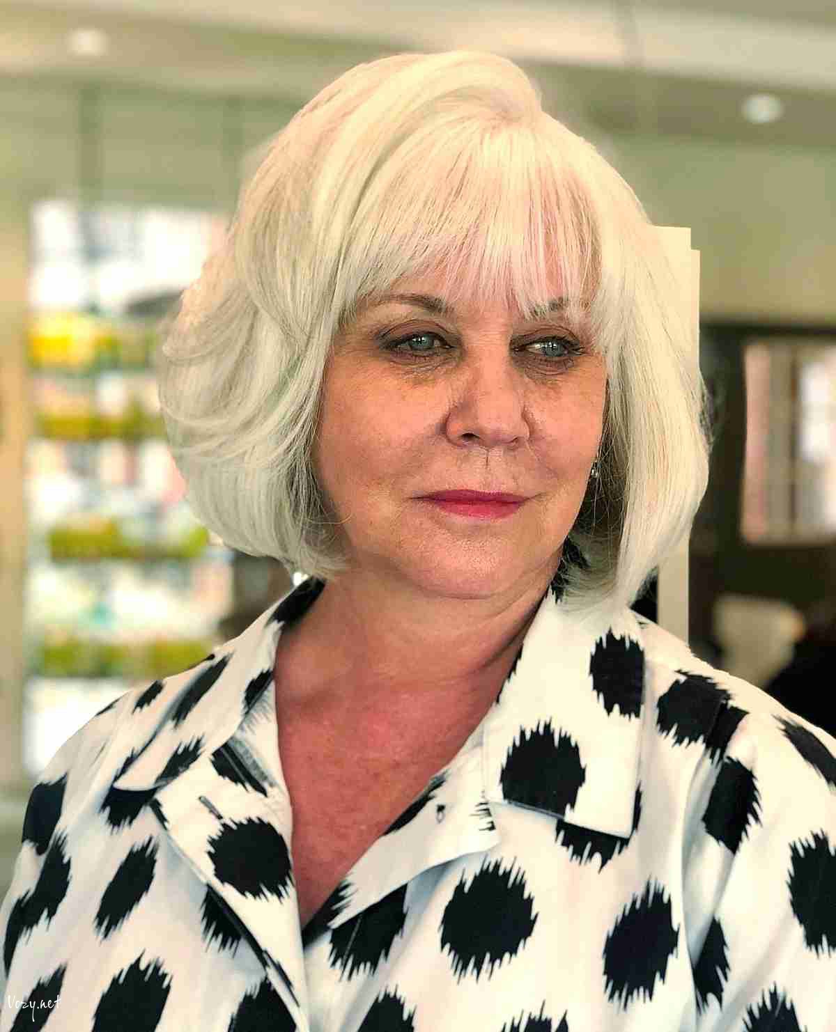 white chin length bob with light bangs for a 50 year old