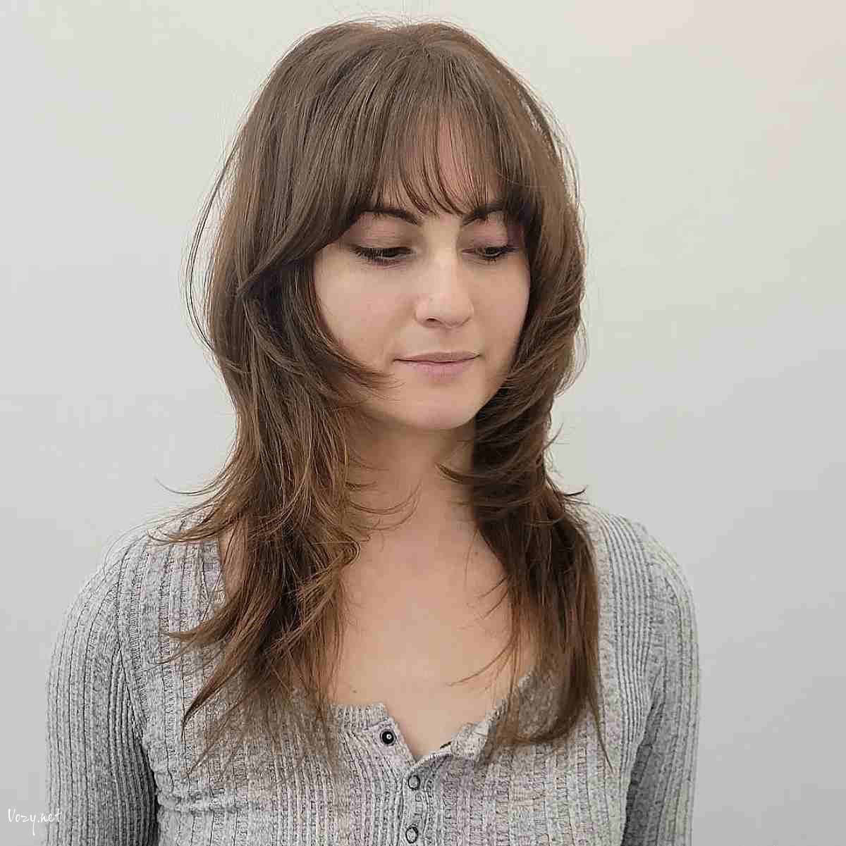 wolf hair with wispy bangs and longer layers