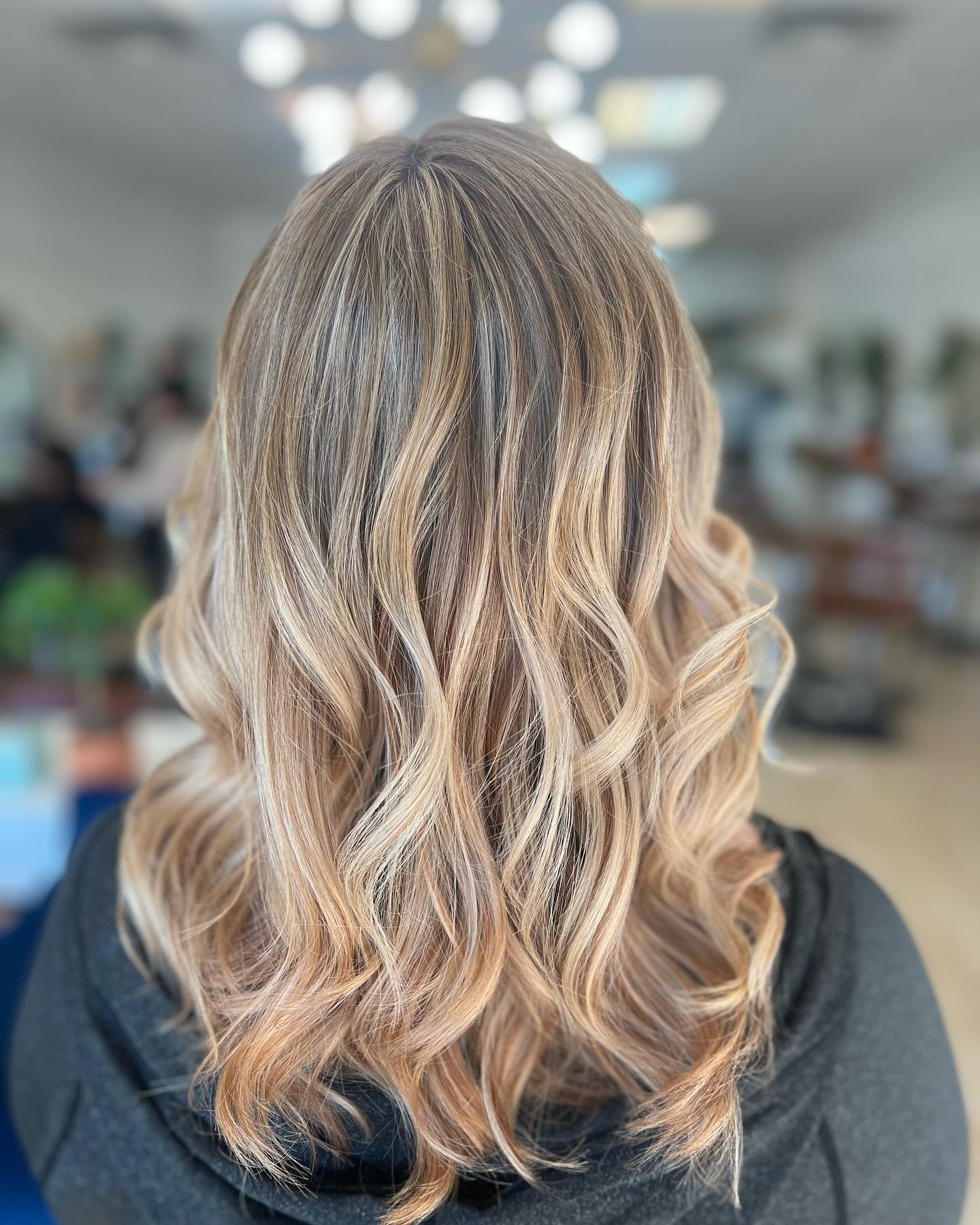 Wavy Warm Toned Haircut
