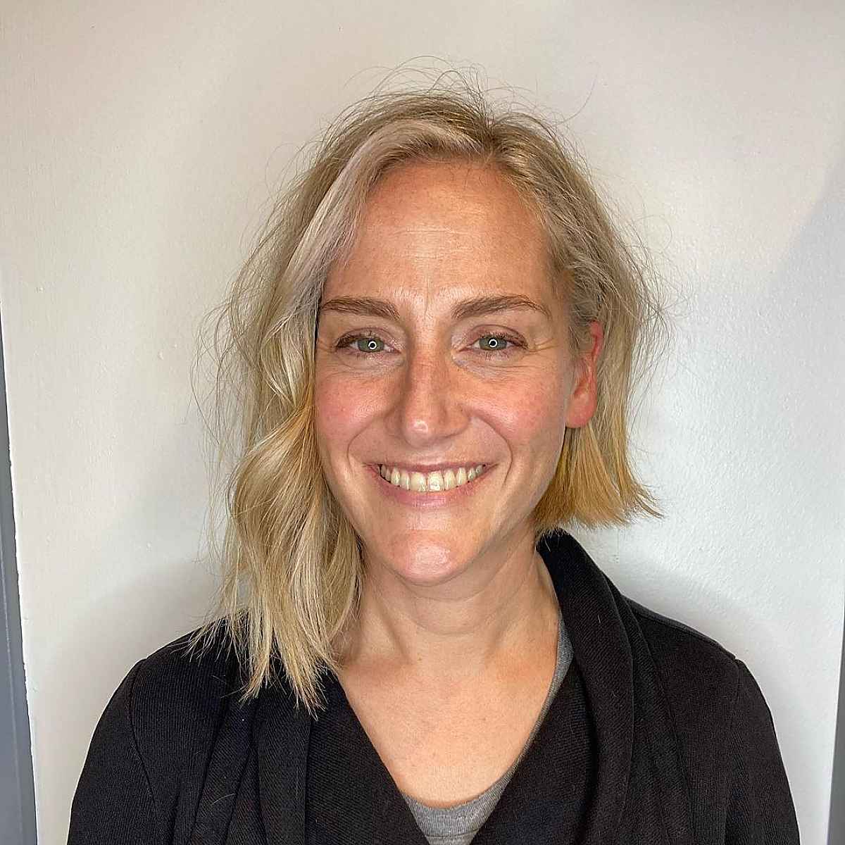 asymmetrical cut for wide foreheads