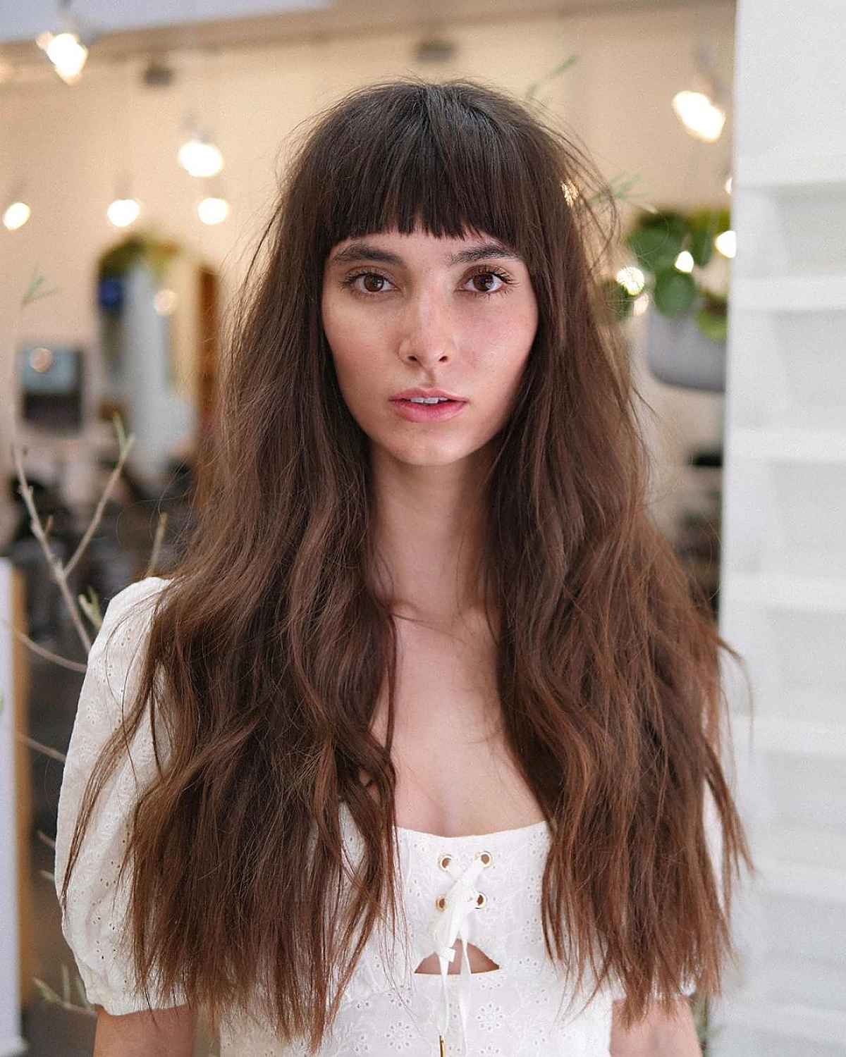 big hair with blunt bangs