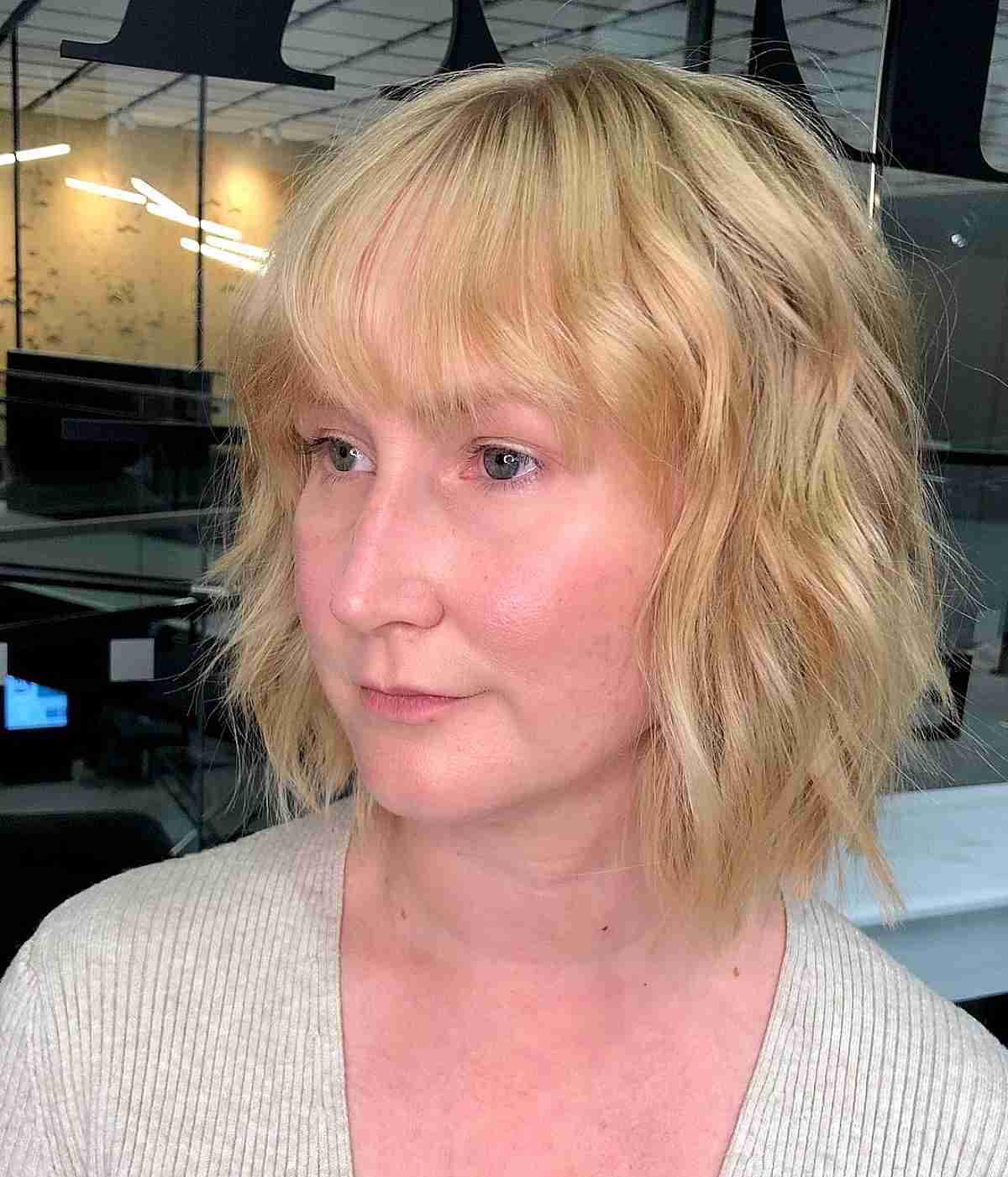 blonde textured bob and bangs for thinning hair