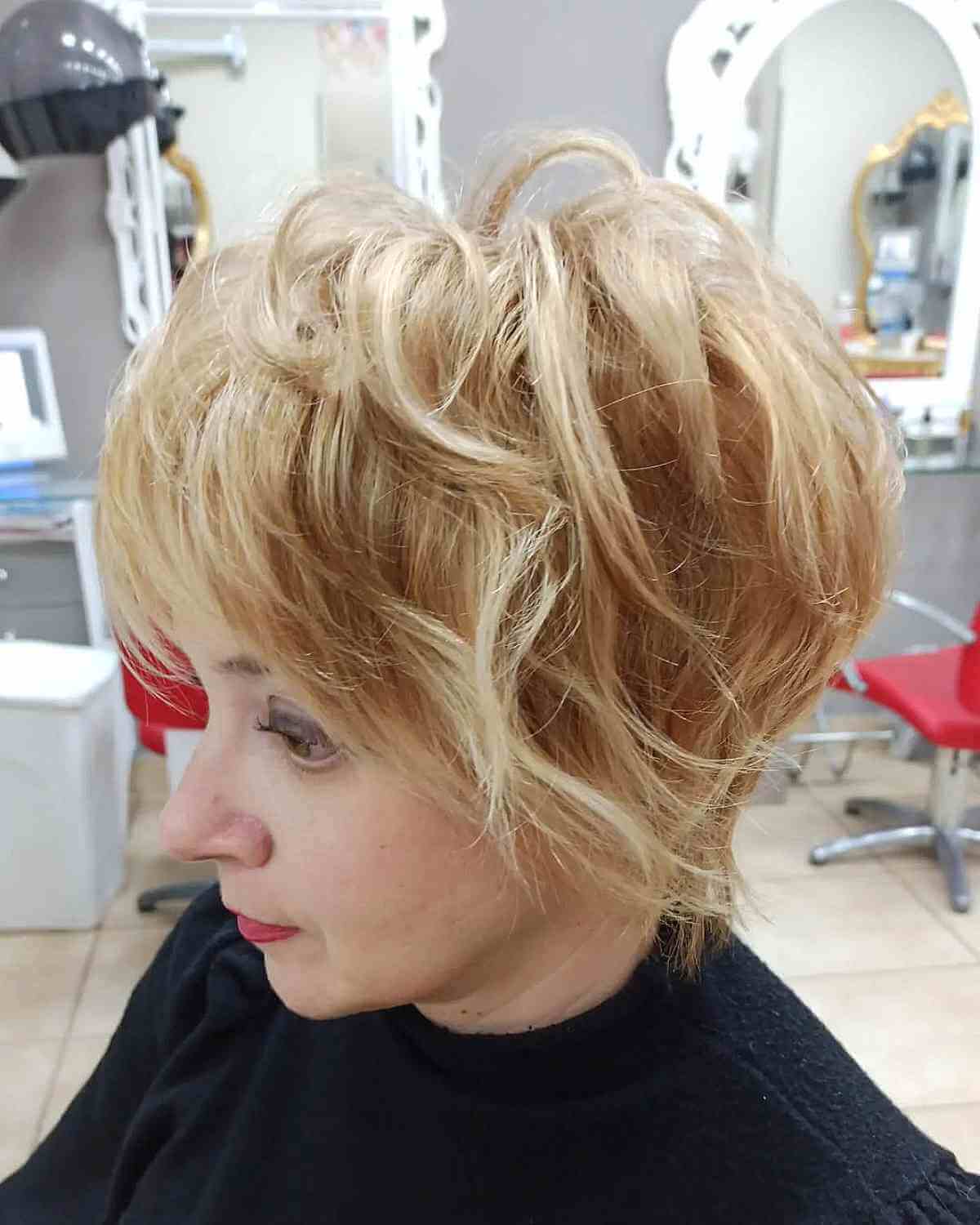 fluffy pixie with feathered layers for older women with thick hair