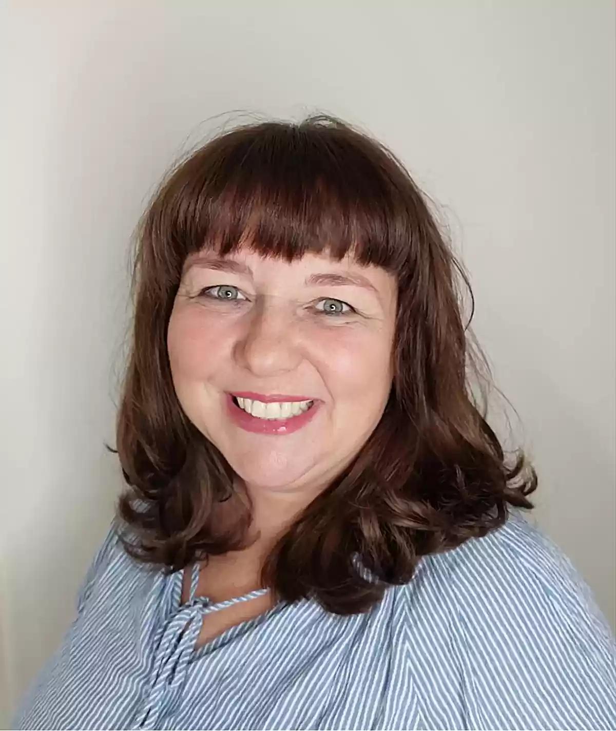 full fringe on a medium length bob haircut for double chins