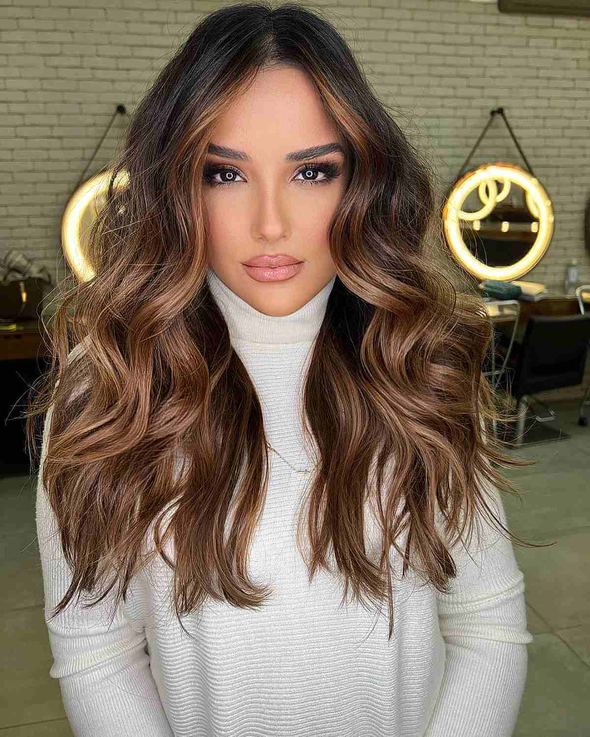 gorgeous long brown balayage for heart faces
