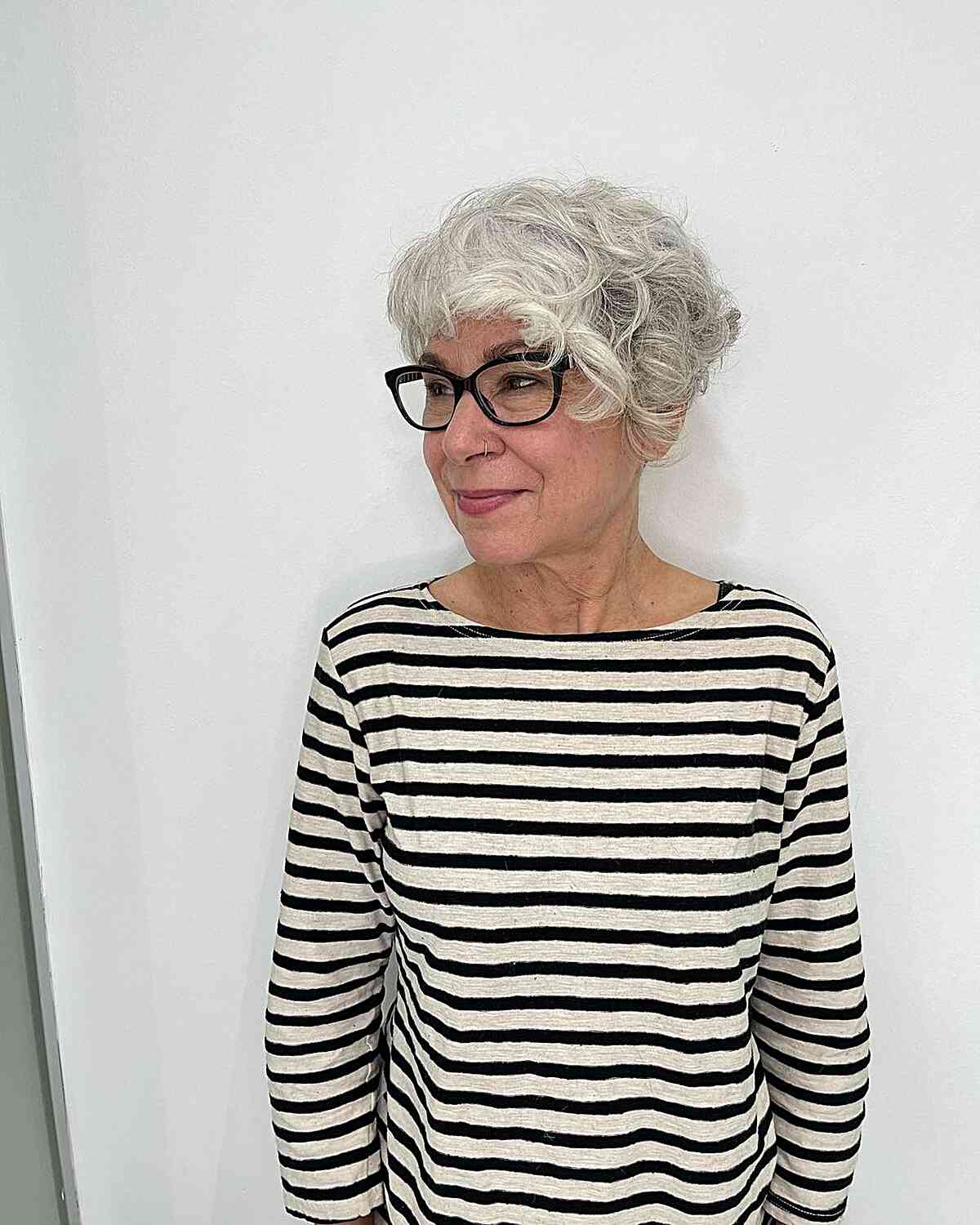 grey textured curly pixie for gals over 60 with specs