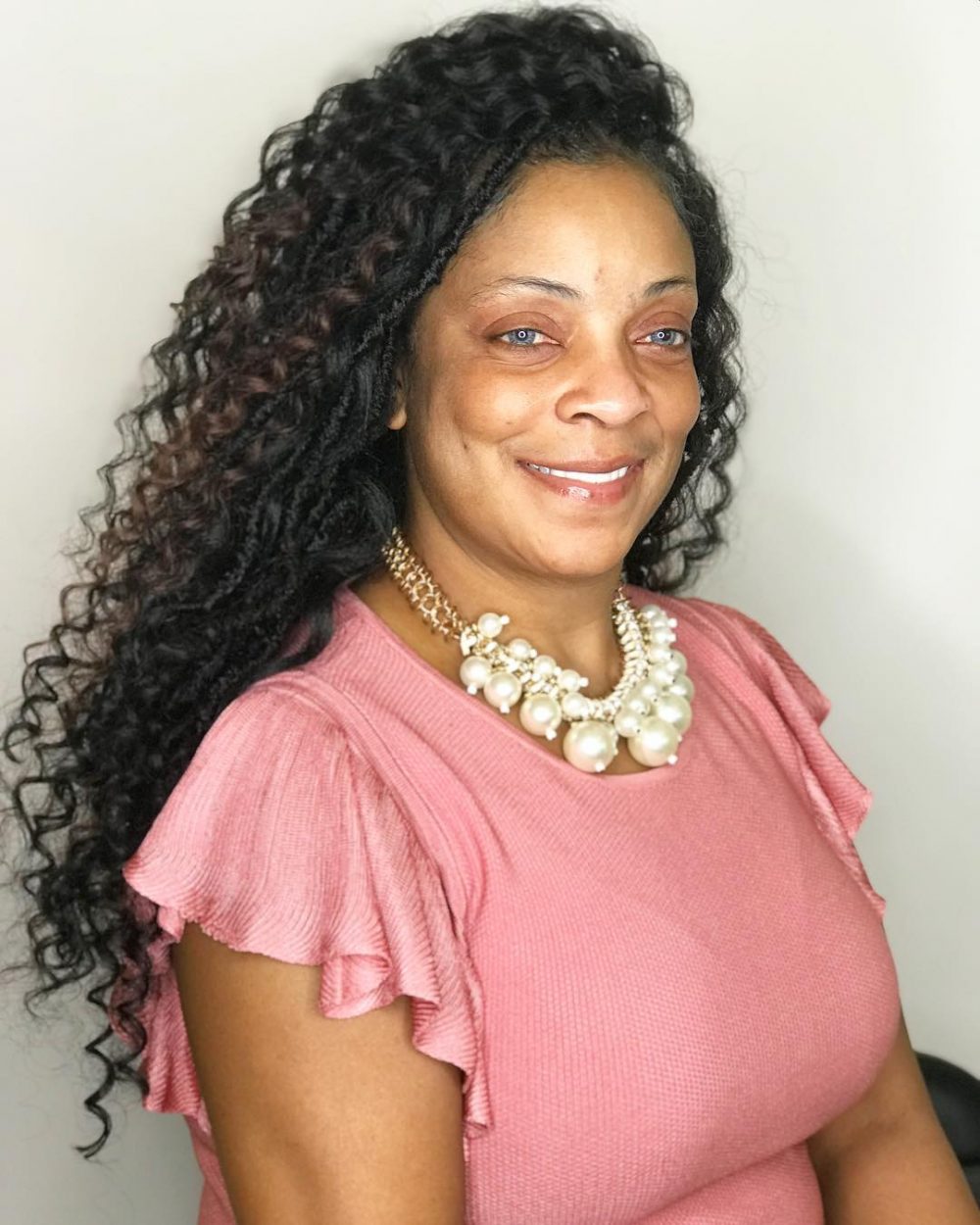 long hairstyle for black woman over 50