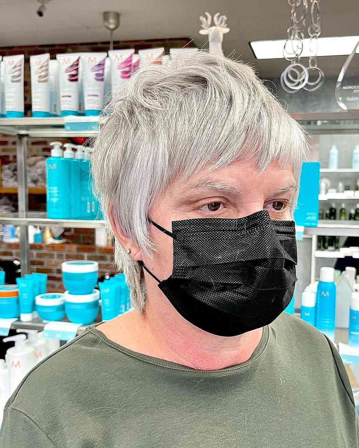 long pixie wolf cut with subtle layers for an old lady