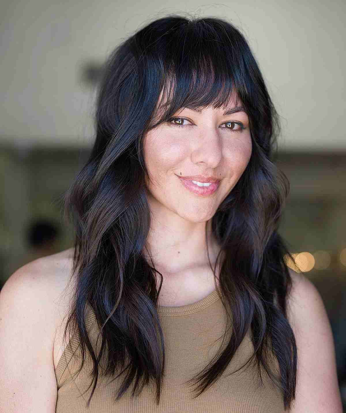 long straight hair with fringe bangs for a heart face