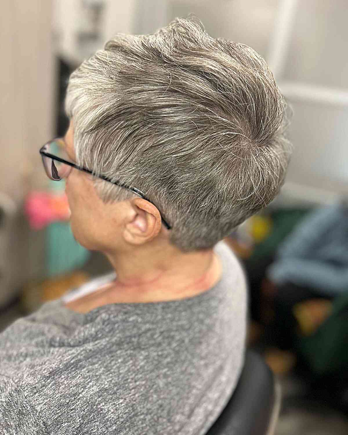 low maintenance gray tapered pixie for older women aged 60 with glasses