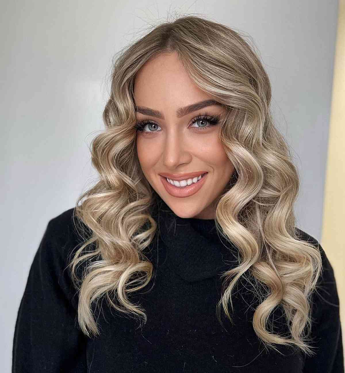 medium length ash blonde hairstyle for heart faces
