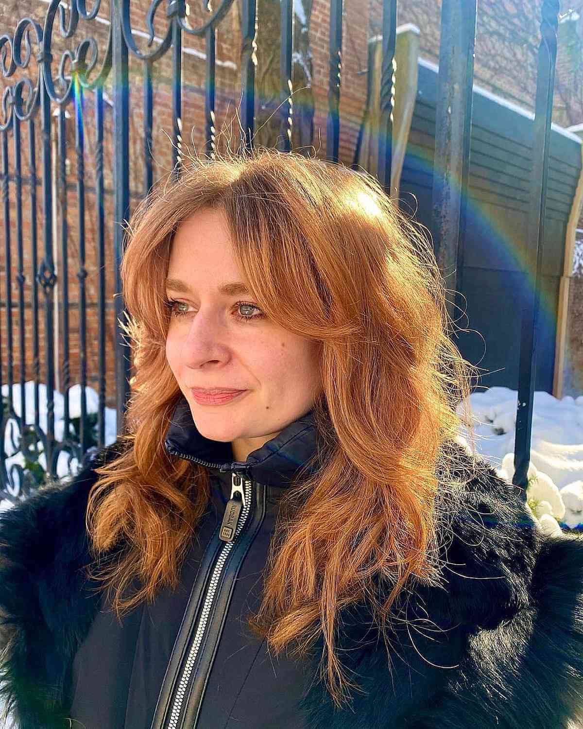 medium shag with curtain bangs for a 40 year old with thick hair