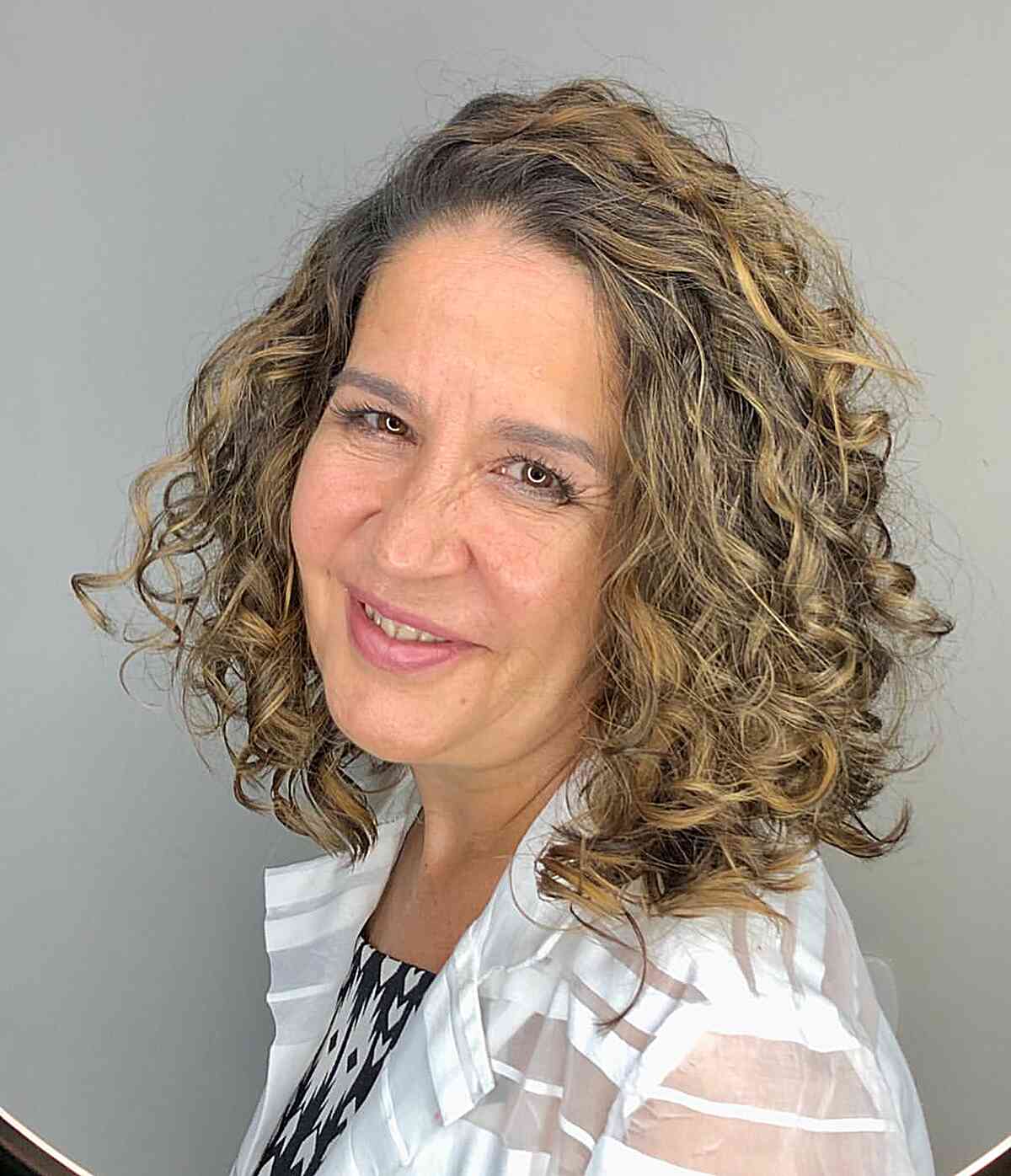 messy layered curls for neck length lob cut for older ladies over 60