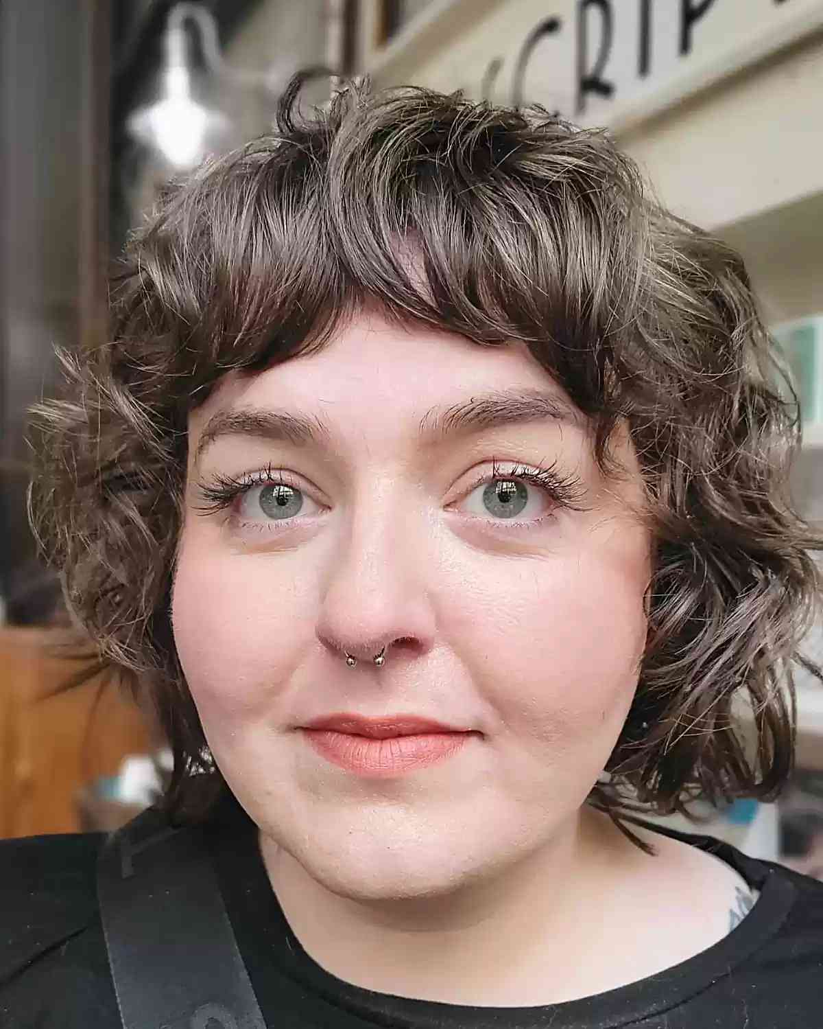 mini curly bob and bangs for chubbier faces