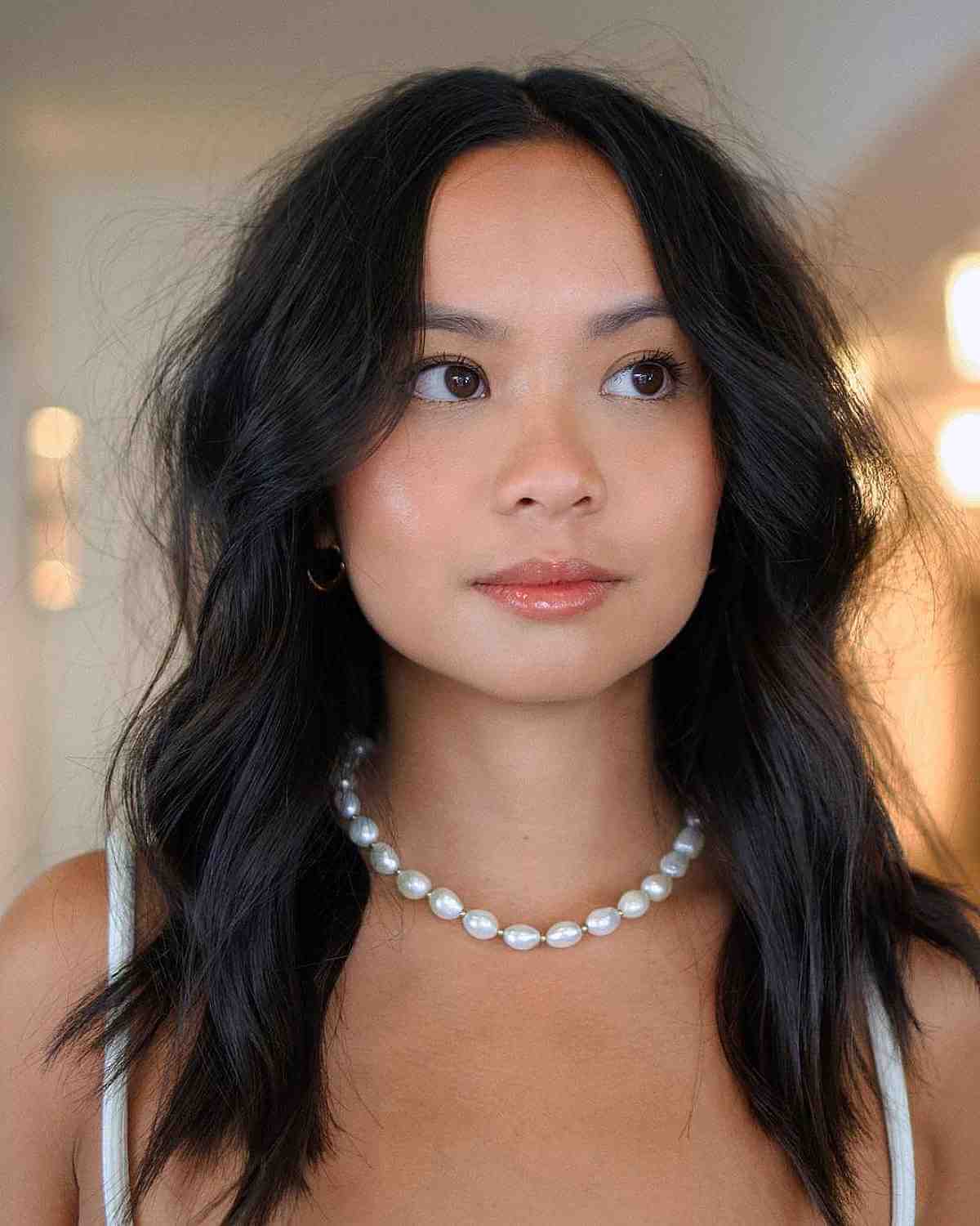 modern shag with a middle part for big foreheads