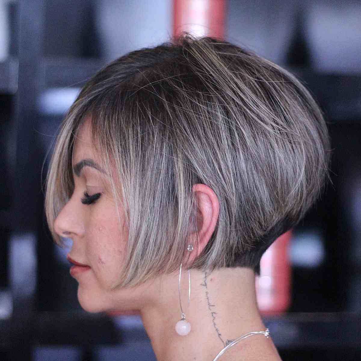 modern stacked bob with a side part