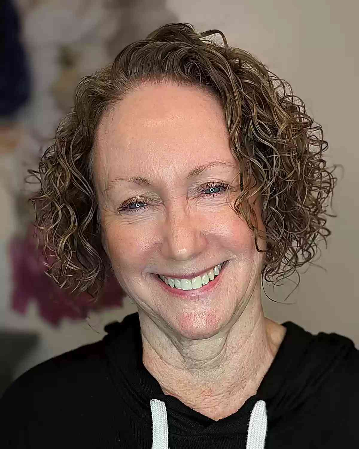 permed curls on jaw length haircut for women over sixty