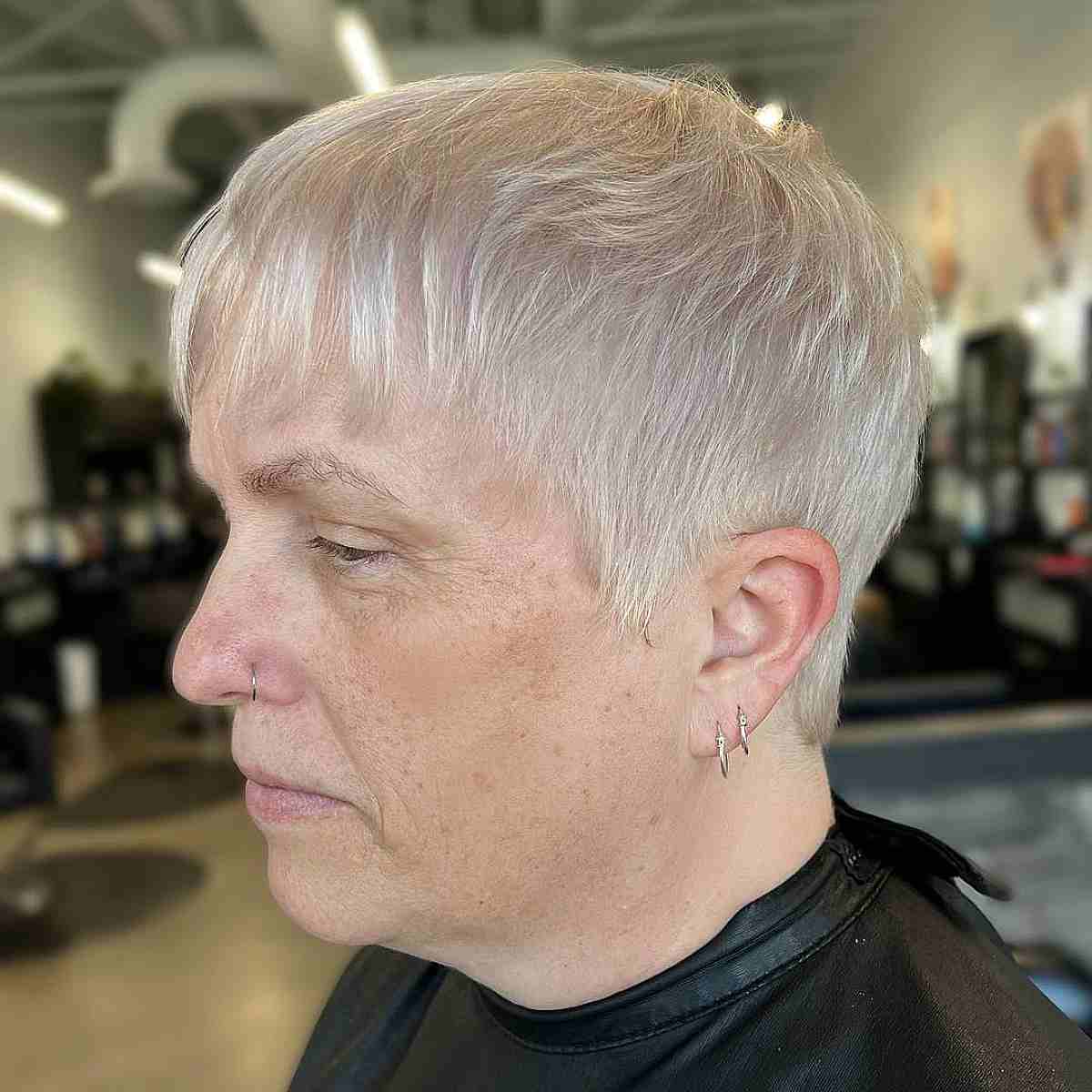 platinum pixie with a wispy fringe for thinning hair