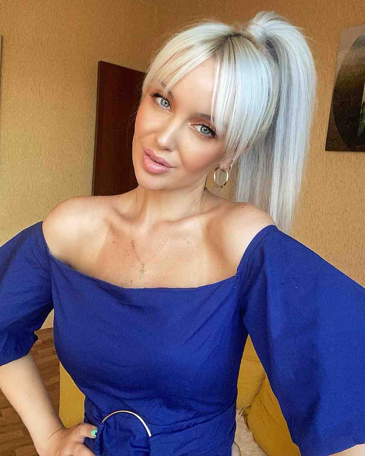ponytail hairstyle with bangs