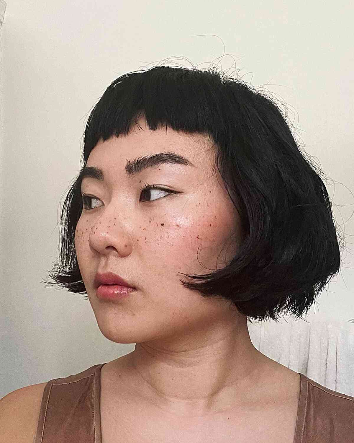razored mini jaw length bob and micro fringe for ladies with fuller face shapes