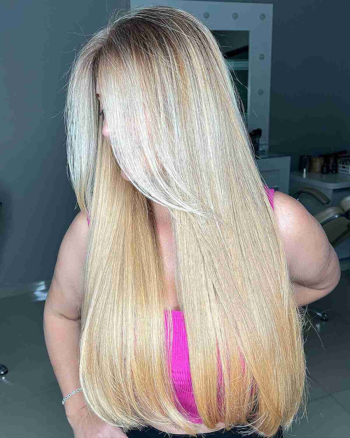 shadow rooted blonde highlights on extra long straight hair