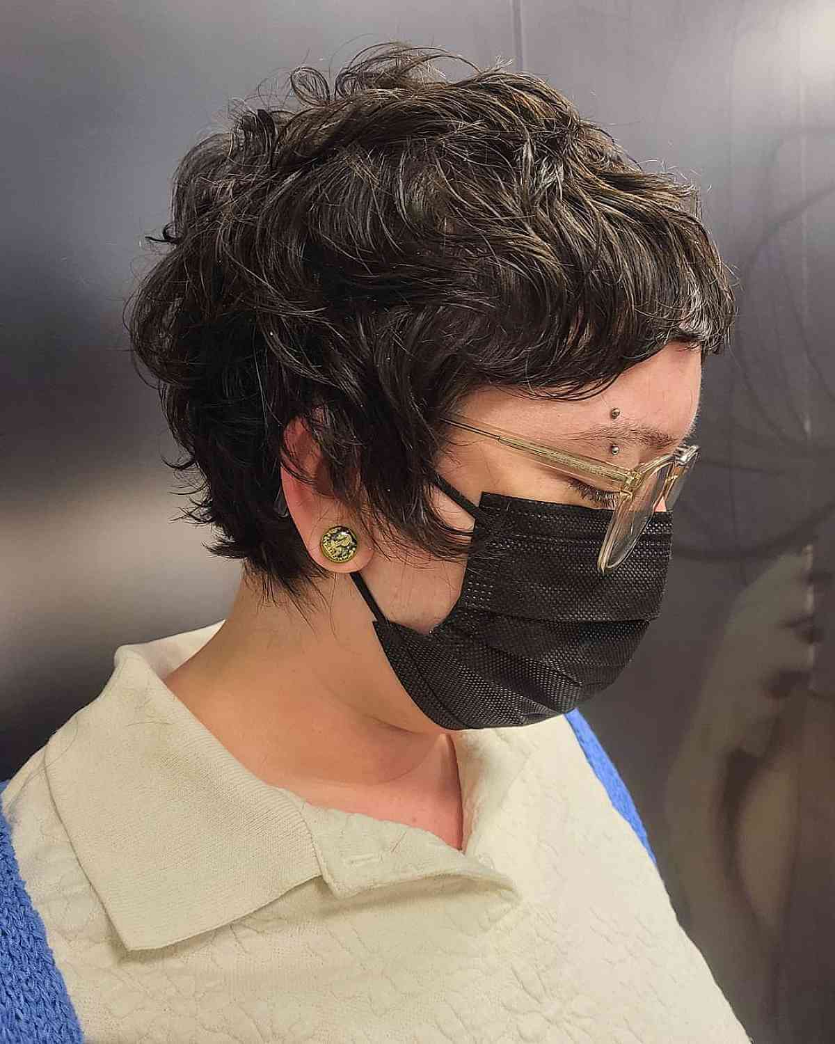 shagged pixie cut on wavy hair for old wome