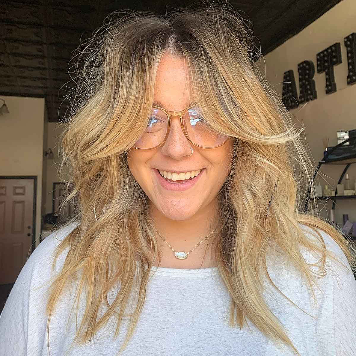 shaggy cut with long curtain bangs for ladies over thirty