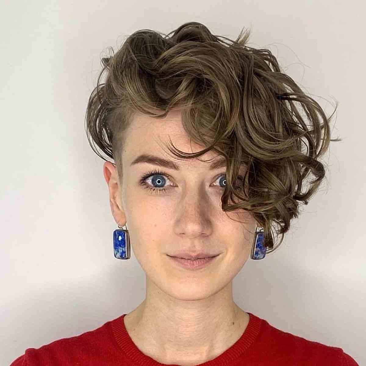 short asymmetrical side swept curls