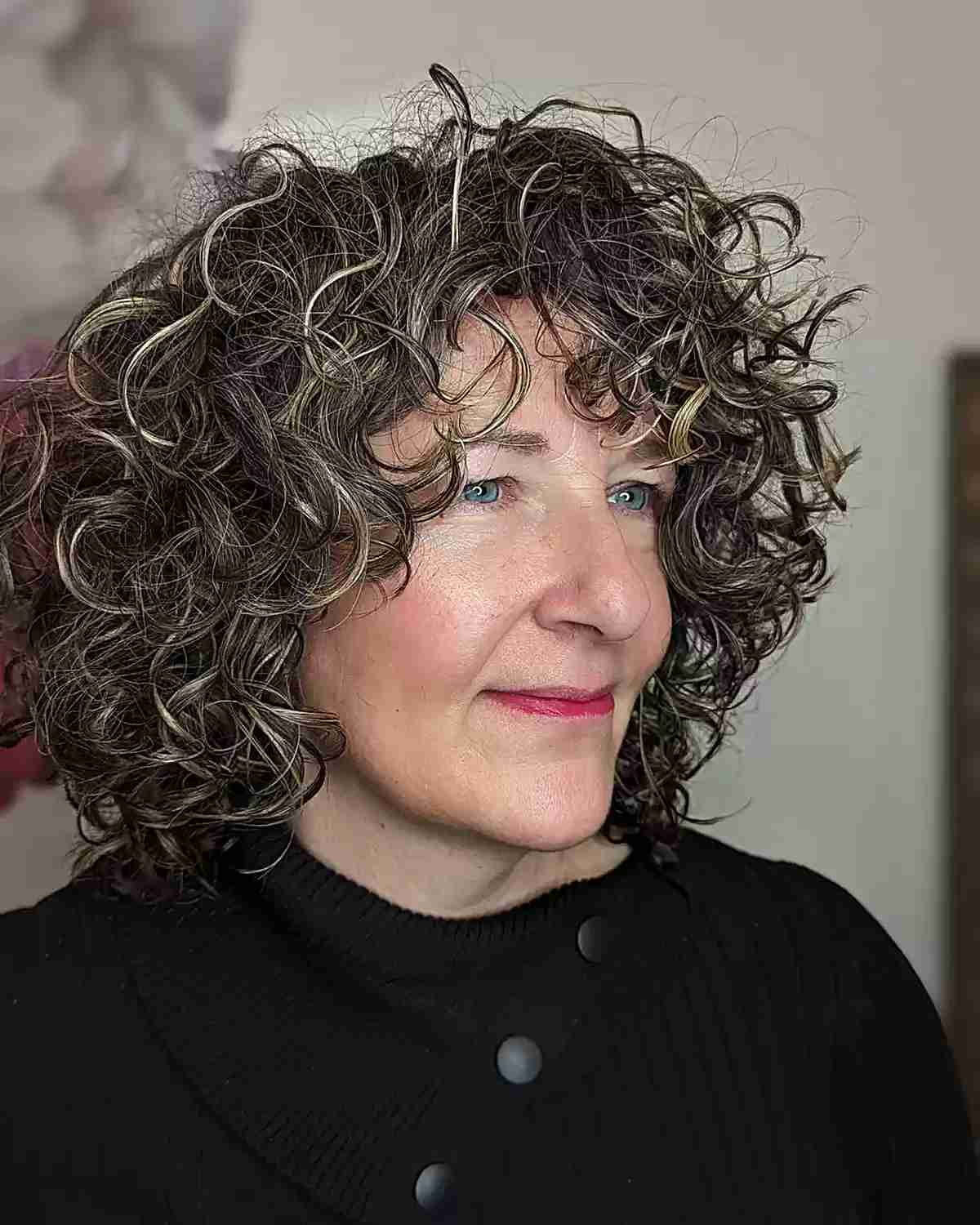 short curly hair with face framing layers for women aged 60