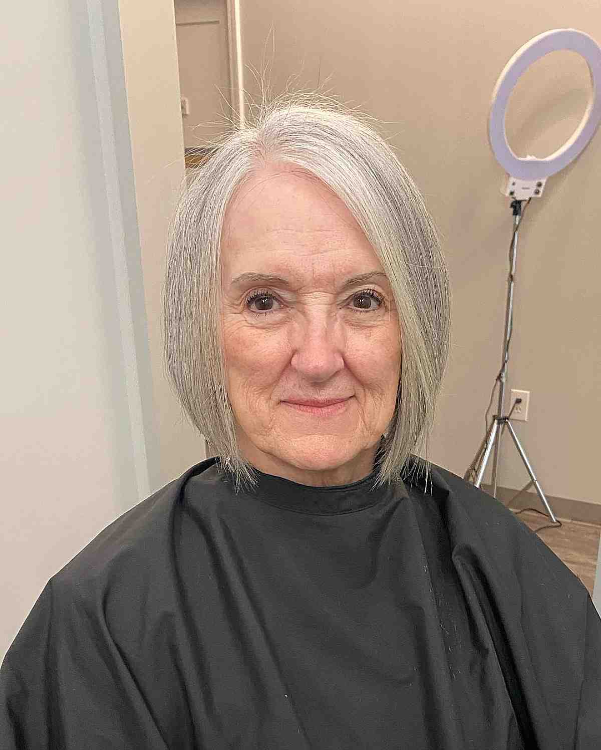 short cut for women over 70 with a big forehead