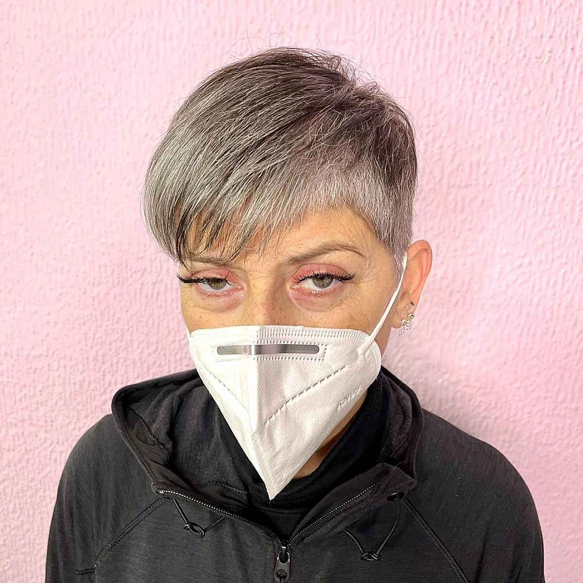 short side swept pixie for fine silver hair in their sixties