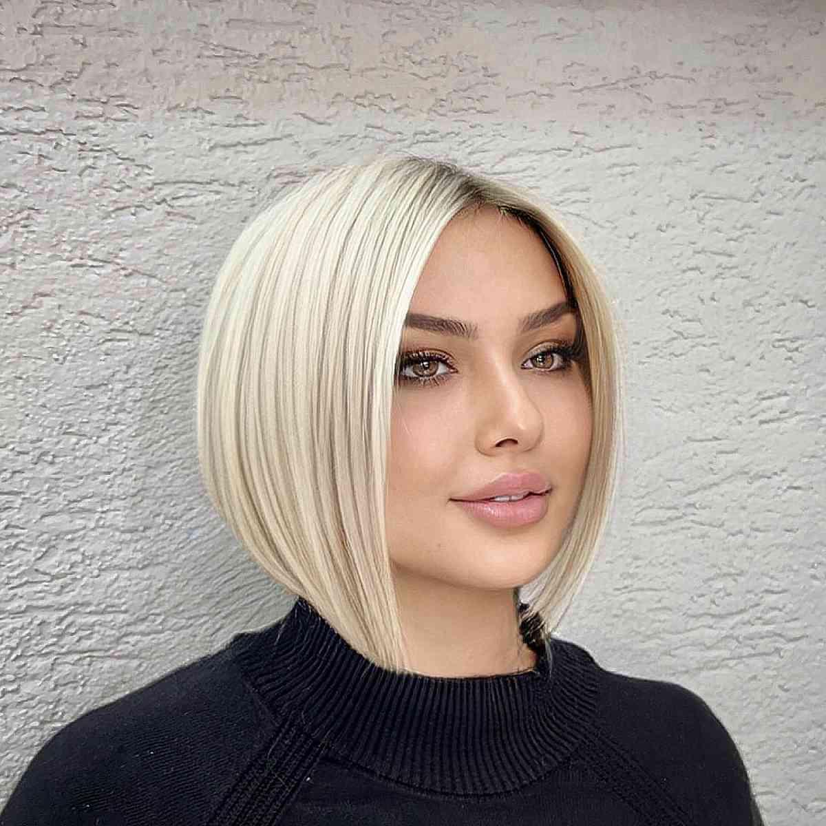 short vanilla blonde a line bob cut