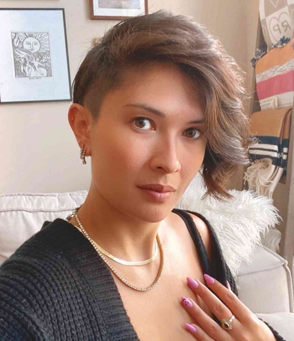 short wispy asymmetric cut with a shaved side