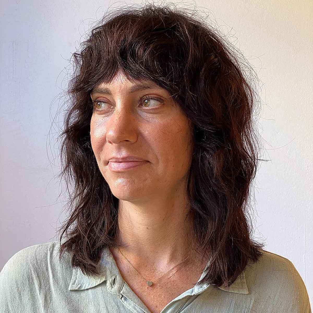 shoulder length shag with curtain bangs