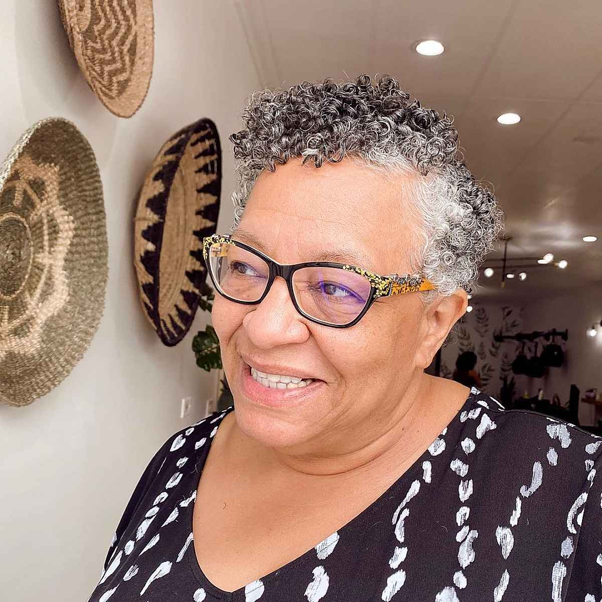 side parted pixie for older women with natural curls
