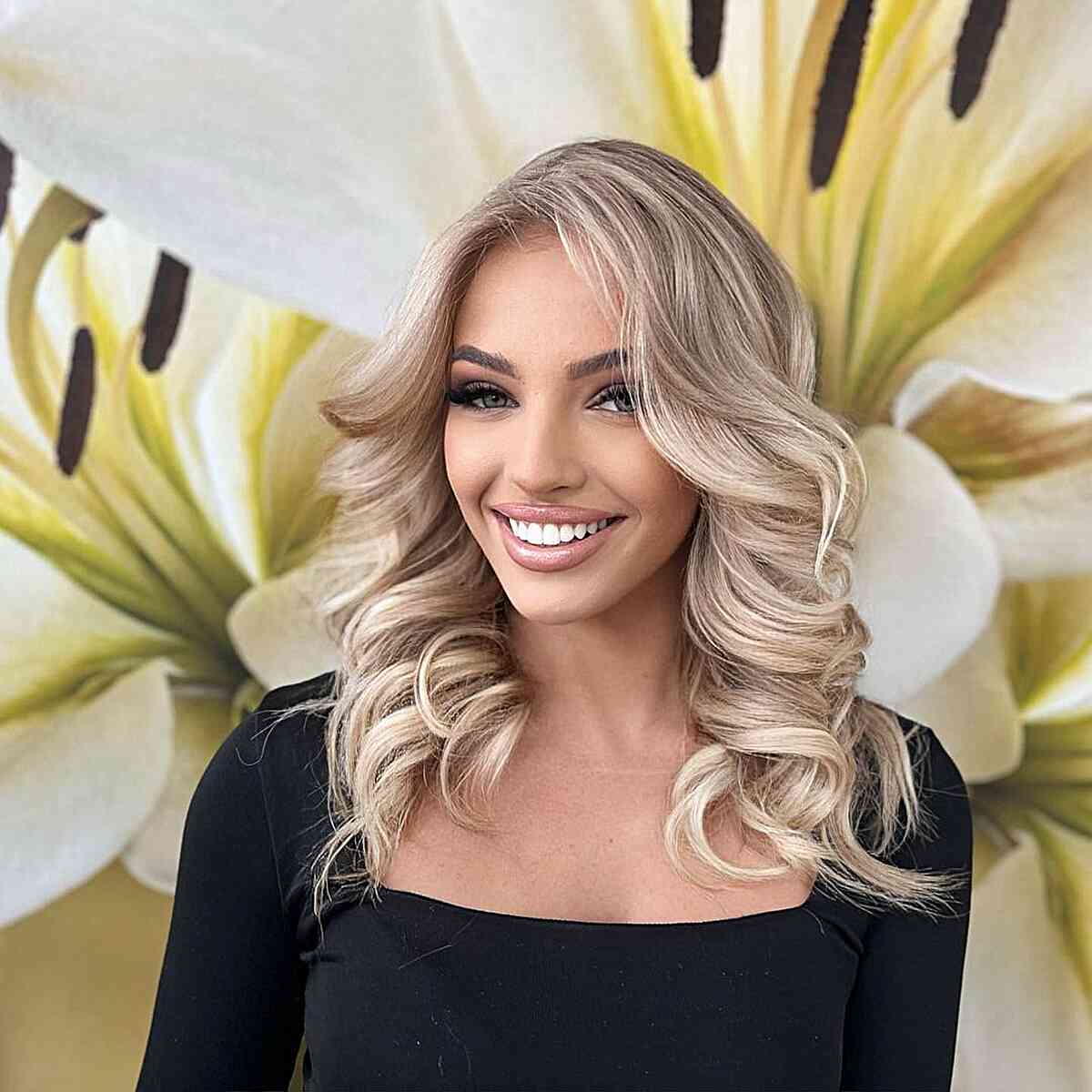 simple big barrel curls on mid length hair