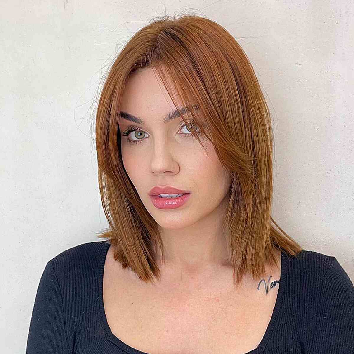 simple lob with wispy long bangs hairstyle