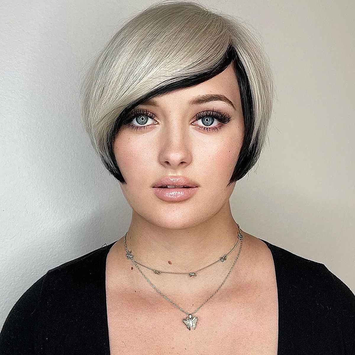 sleek cut with side swept bangs for women over 30