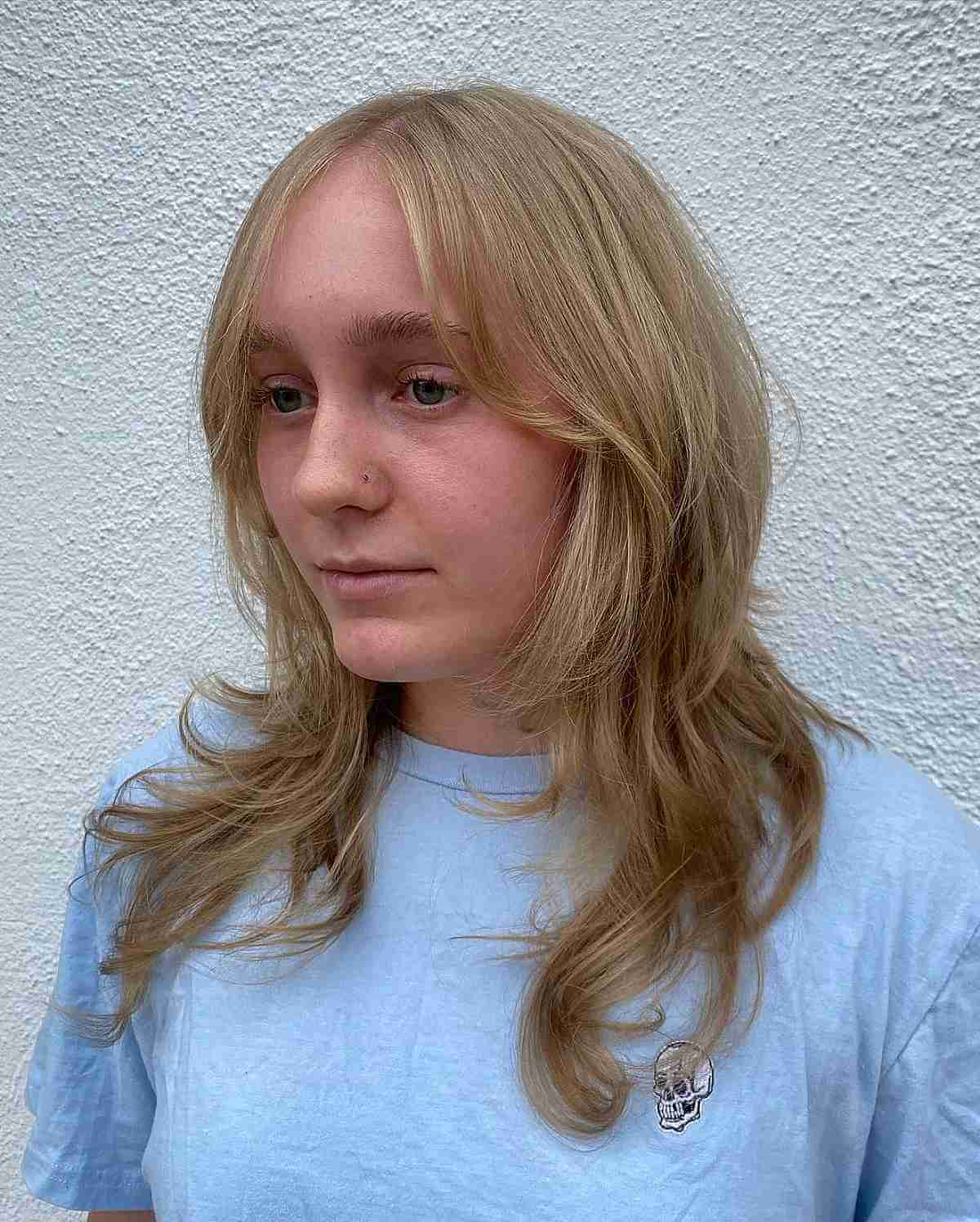 soft wavy shaggy layers with a face frame for thinning hair