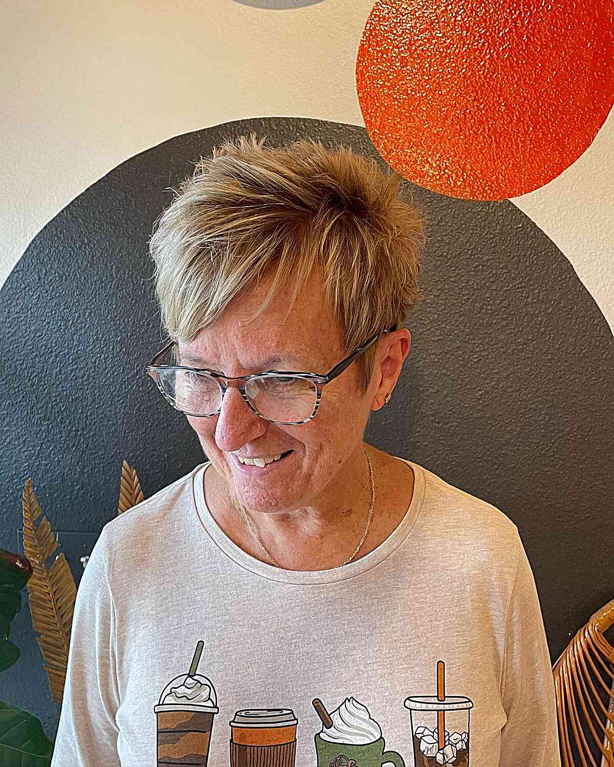 spiky edgy short pixie hair with side fringe for 60 year old women with glasses
