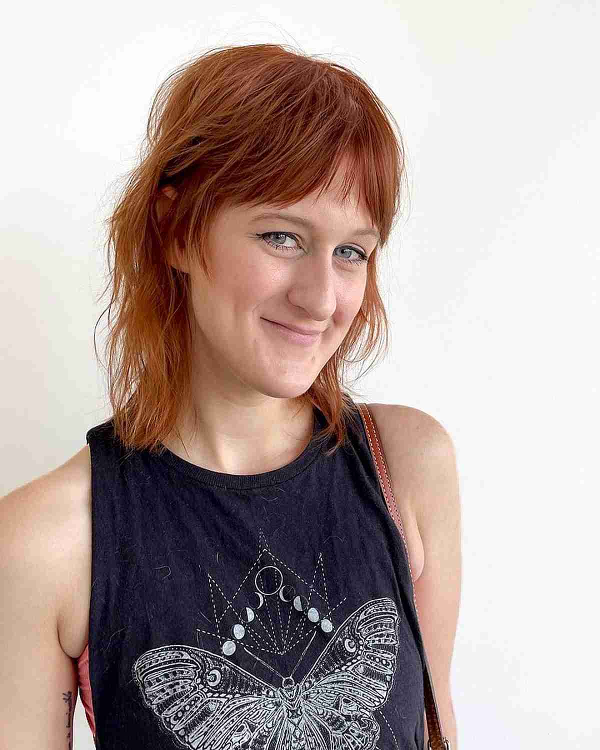thinning disconnected shag cut with curtain bangs