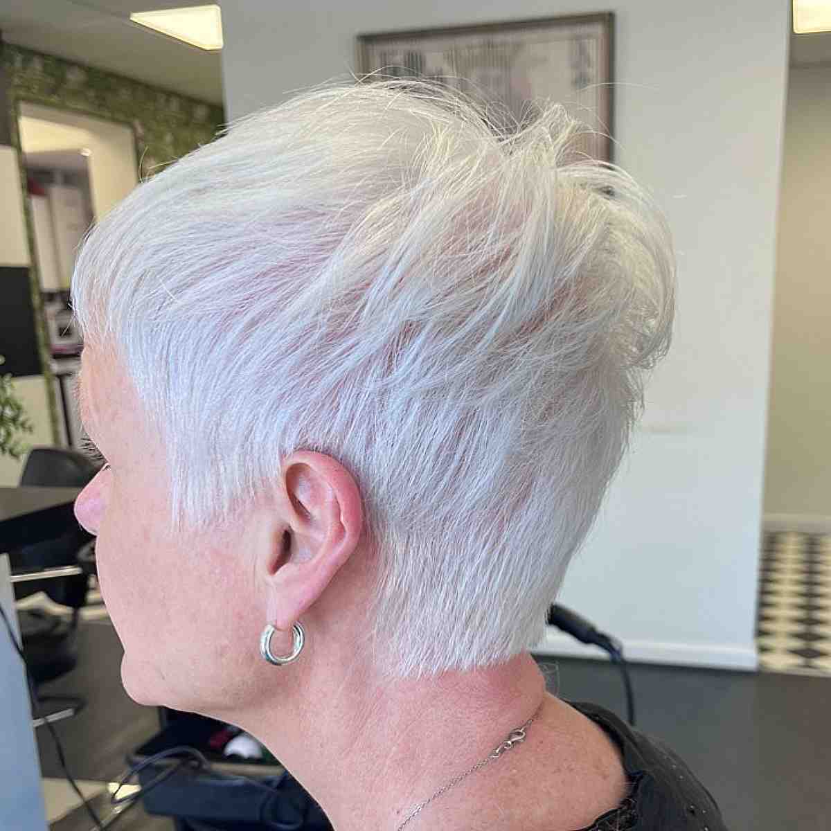 thinning white blonde pixie crop with piecey layers