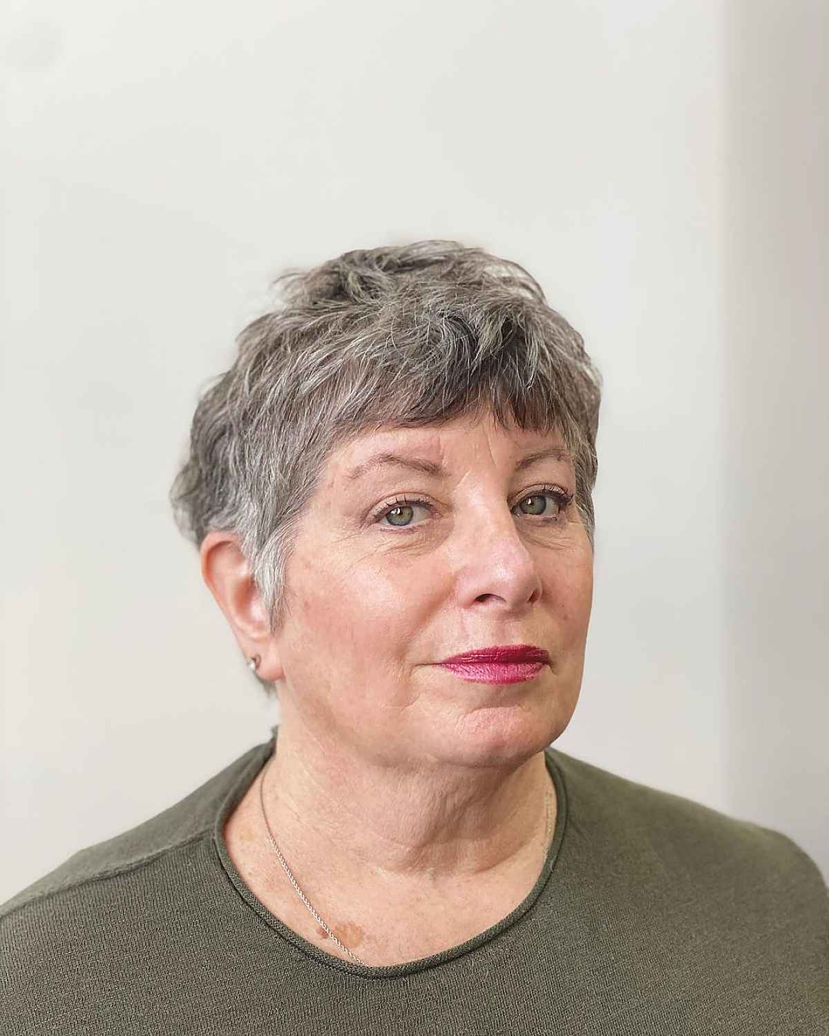 tousled pixie shag with a fringe for ladies over 60