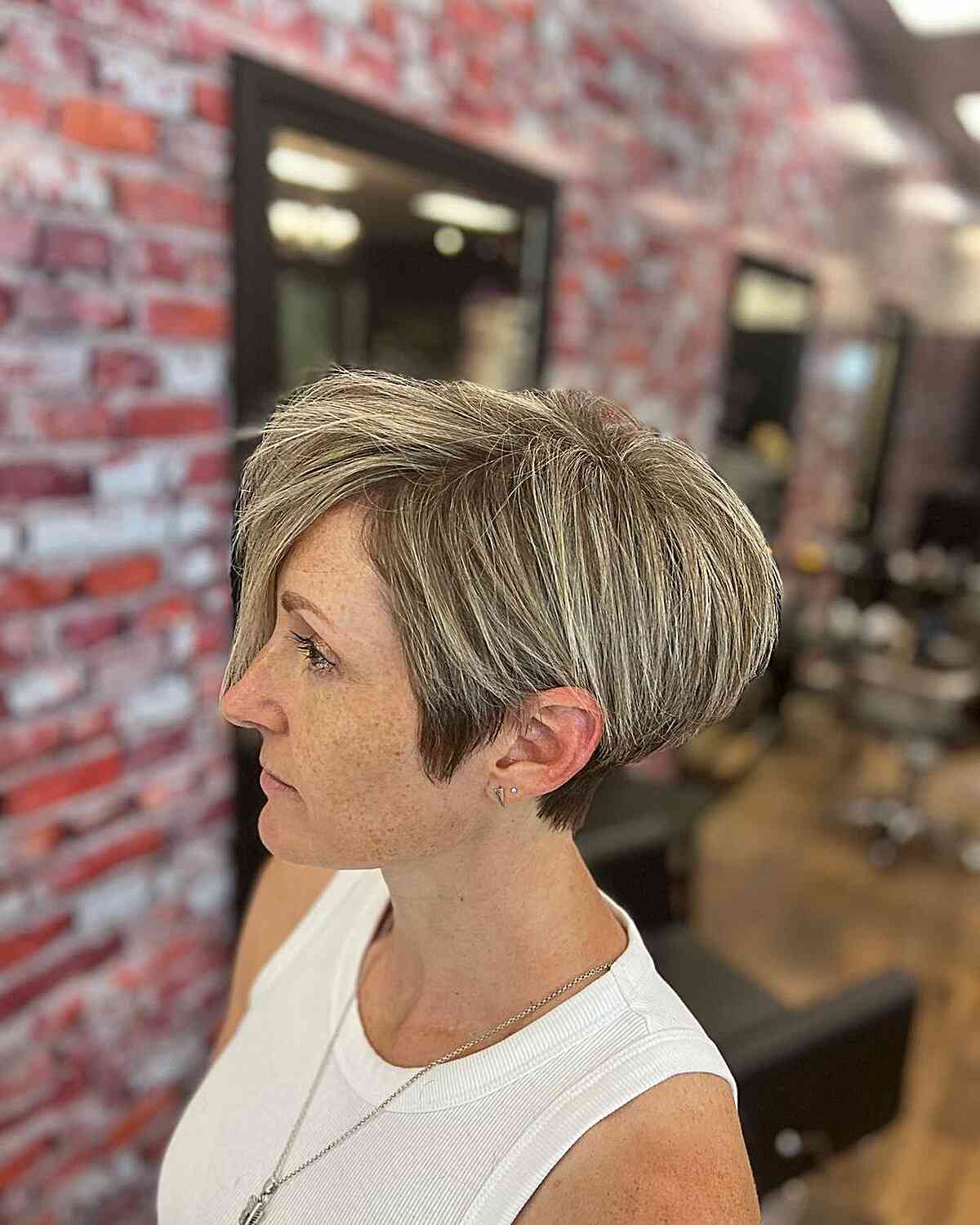 very short bixie with tapered nape for mature old ladies