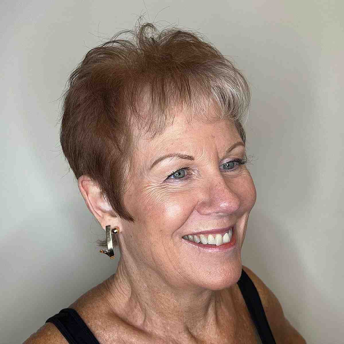 very short feathered crop with short bangs for thin hair