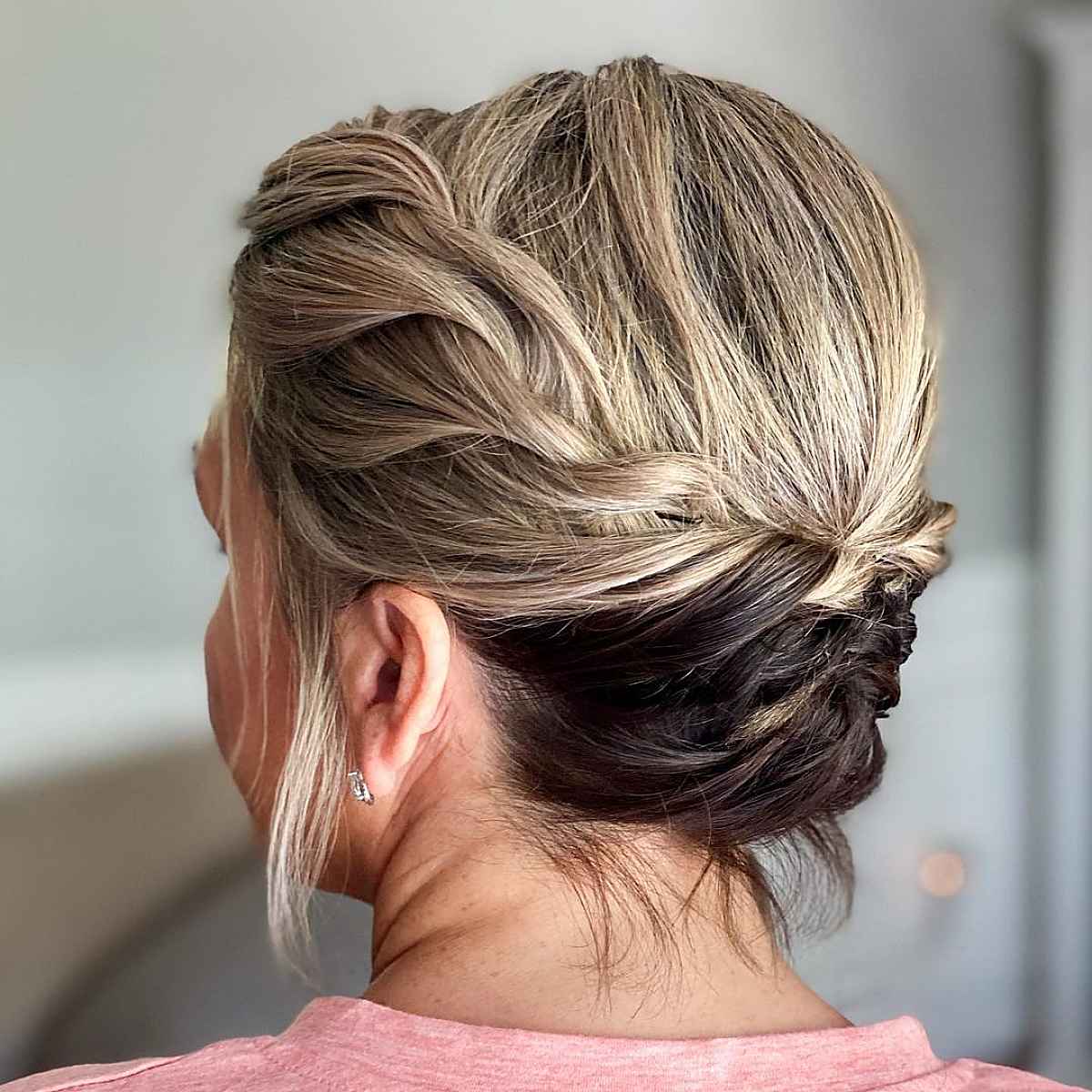 youthful looking updo on medium hair