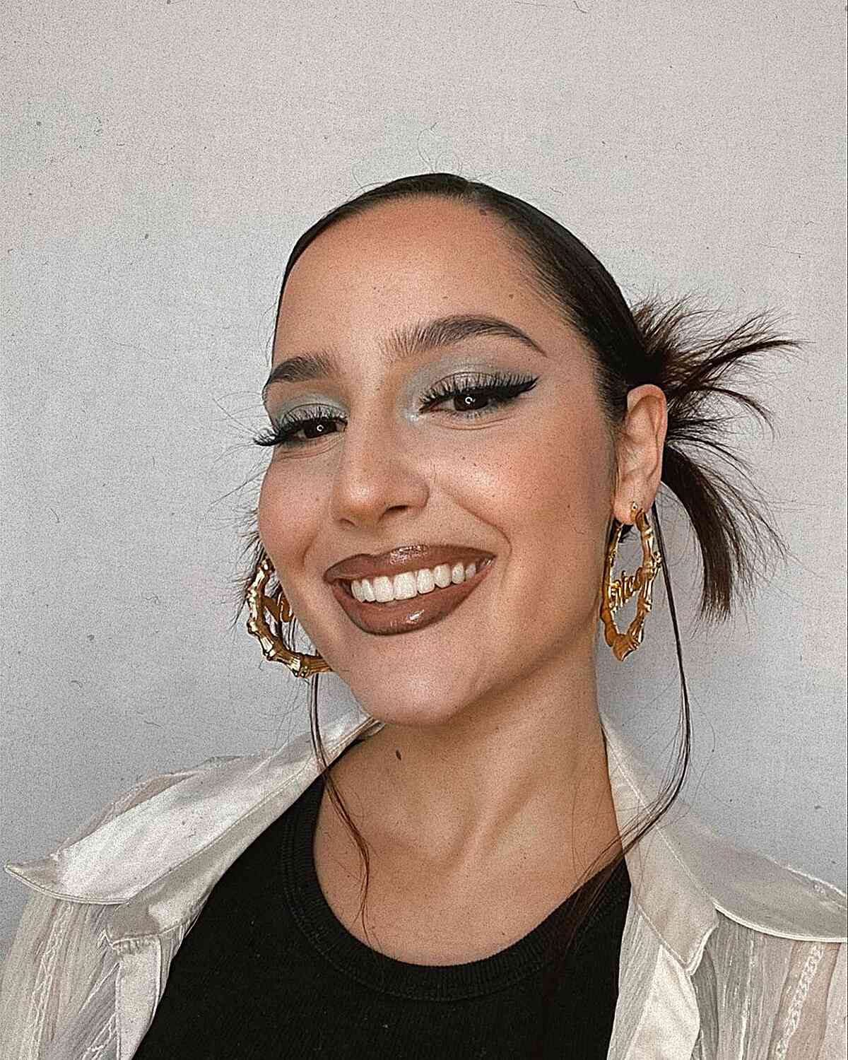 2000 inspired sleek spiky updo