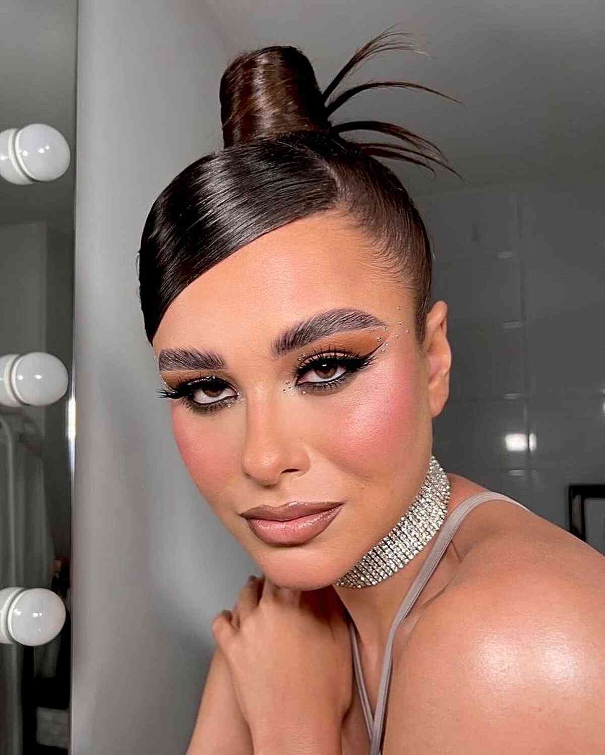2000s sleek deep side part and top bun