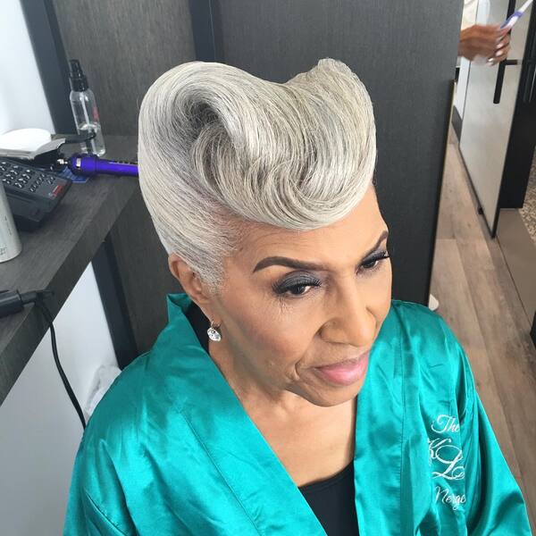 Flick Weave Rolled Back Updo