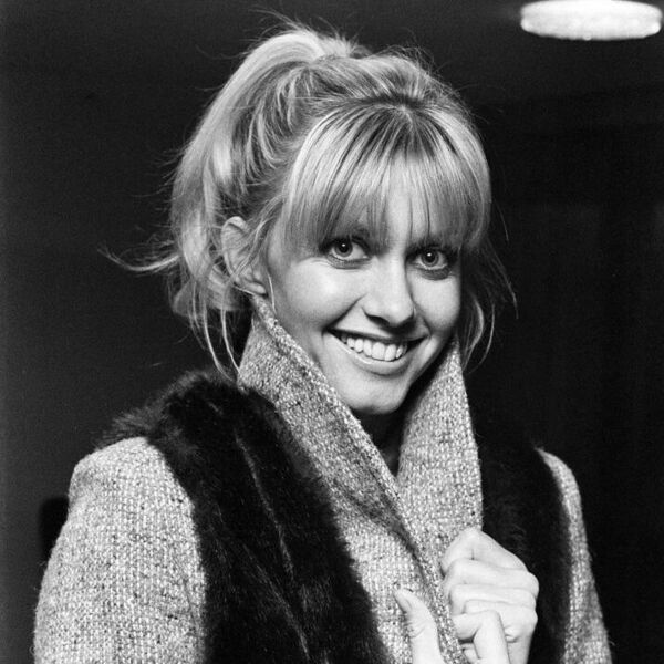 Olivia Newtons Ponytail with Full Bangs